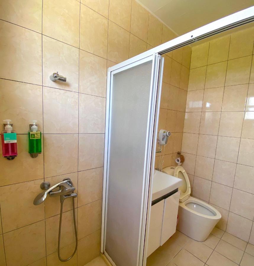 Lei Mi Er Hua Yuan Min Su Apartment Pinghe Exterior photo